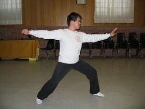 Secret_Of_Yin_Yang_Symbol_011-SingleWhipTaiChiPosture
